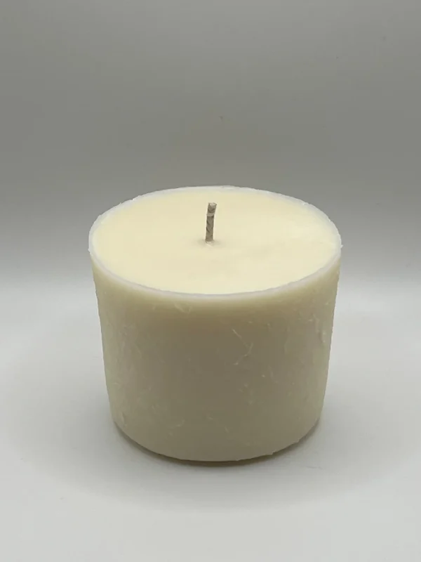 A container candle, refilled with British Wax refill blend